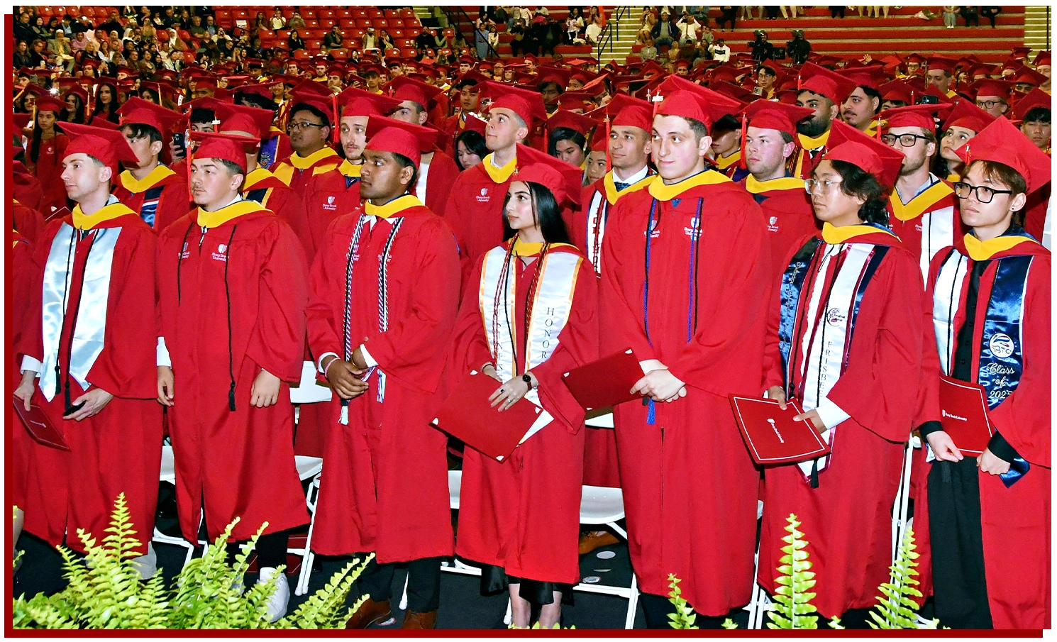 students in regalia at convocaiton