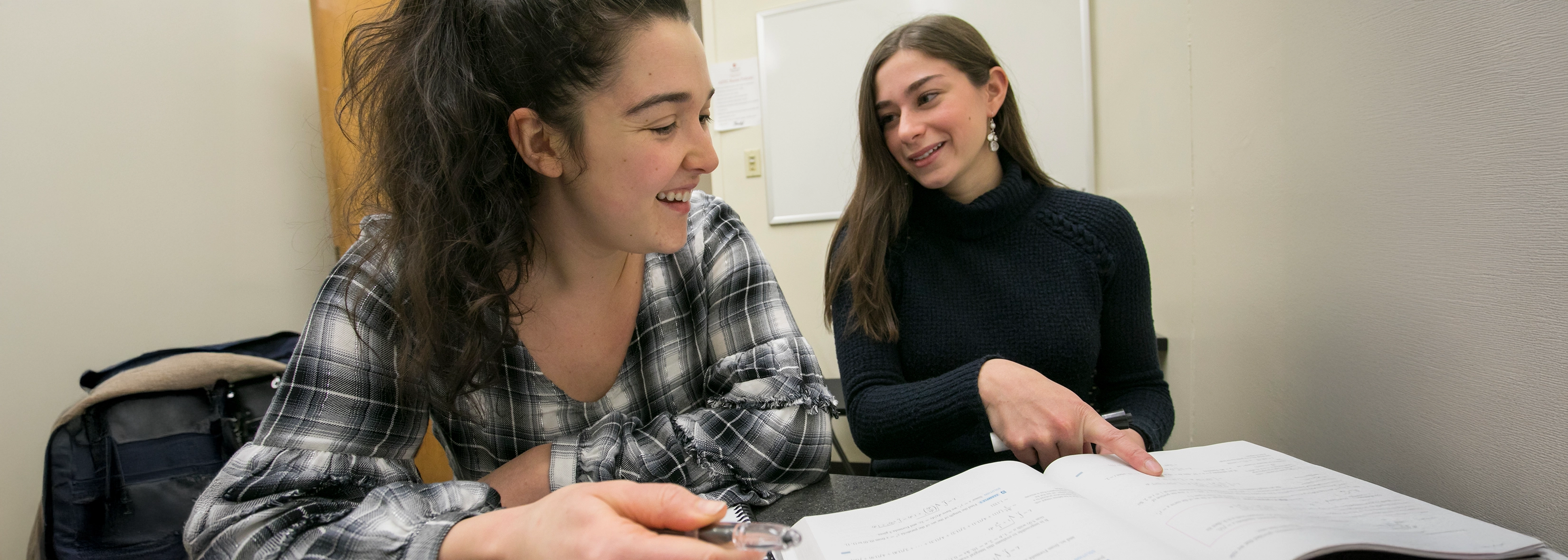 SUNY Stony Brook University College of Business Peer mentoring program students in a mentoring session