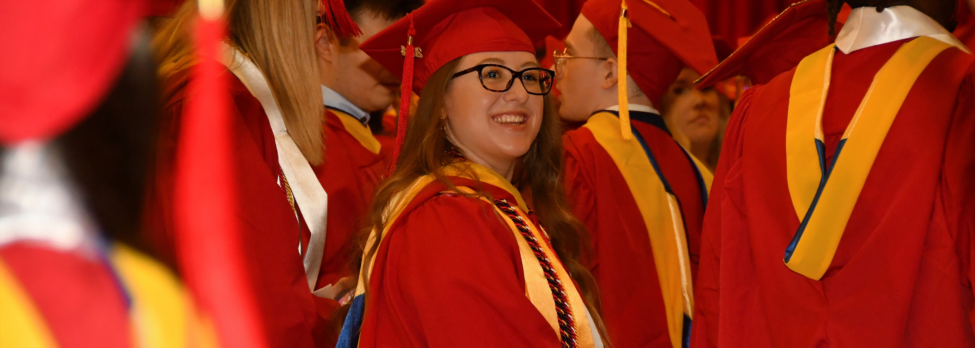 SUNY Stony Brook University College of Business Students at Convocation in their caps and gowns