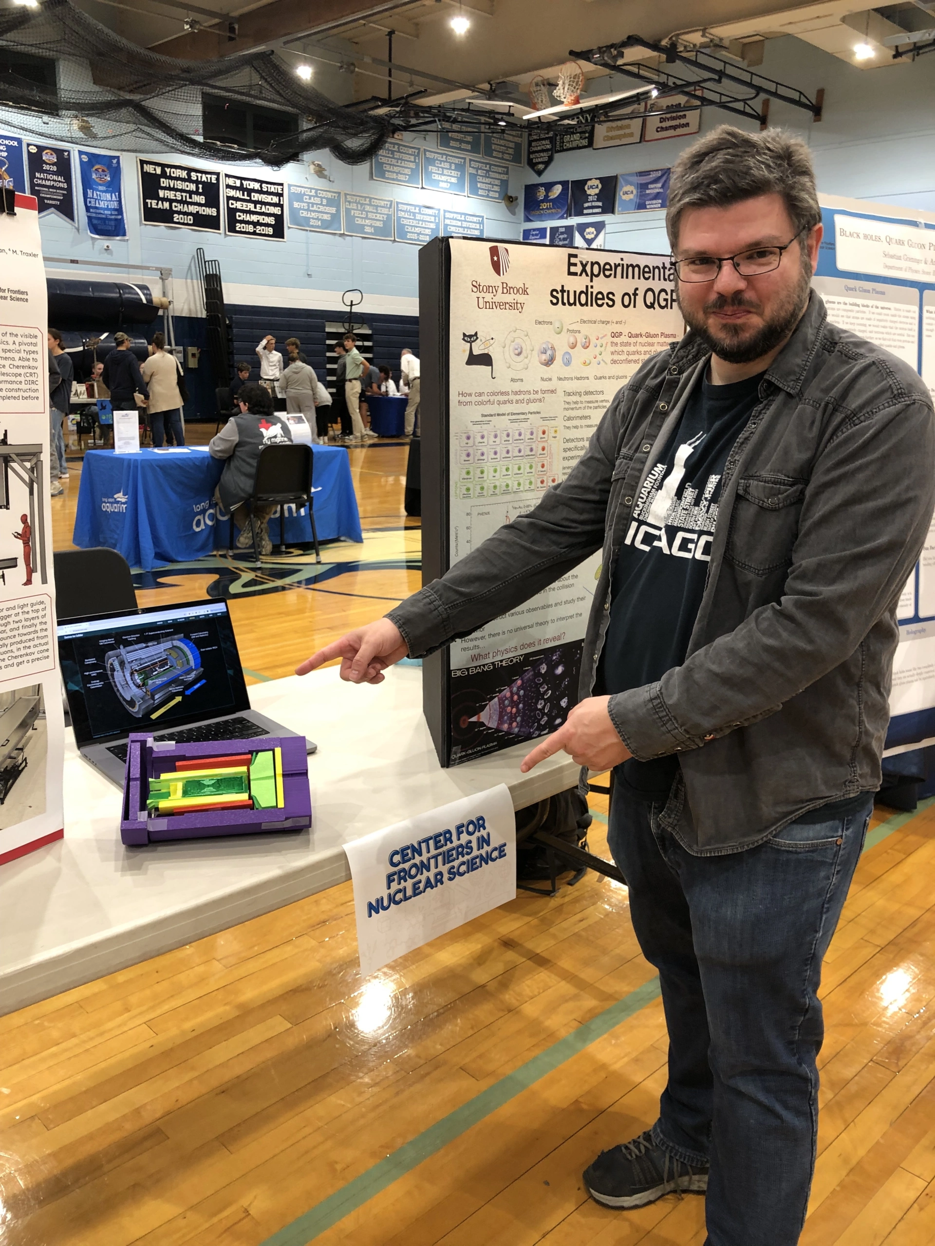 Prof. Jan Bernauer, Center for Frontiers in Nuclear Science (CFNS), Department of Physics and Astronomy, Stony Brook University, pictured here with the 3D model of ePIC at Rocky Point School's STEAM event on Nov. 7, 2024.