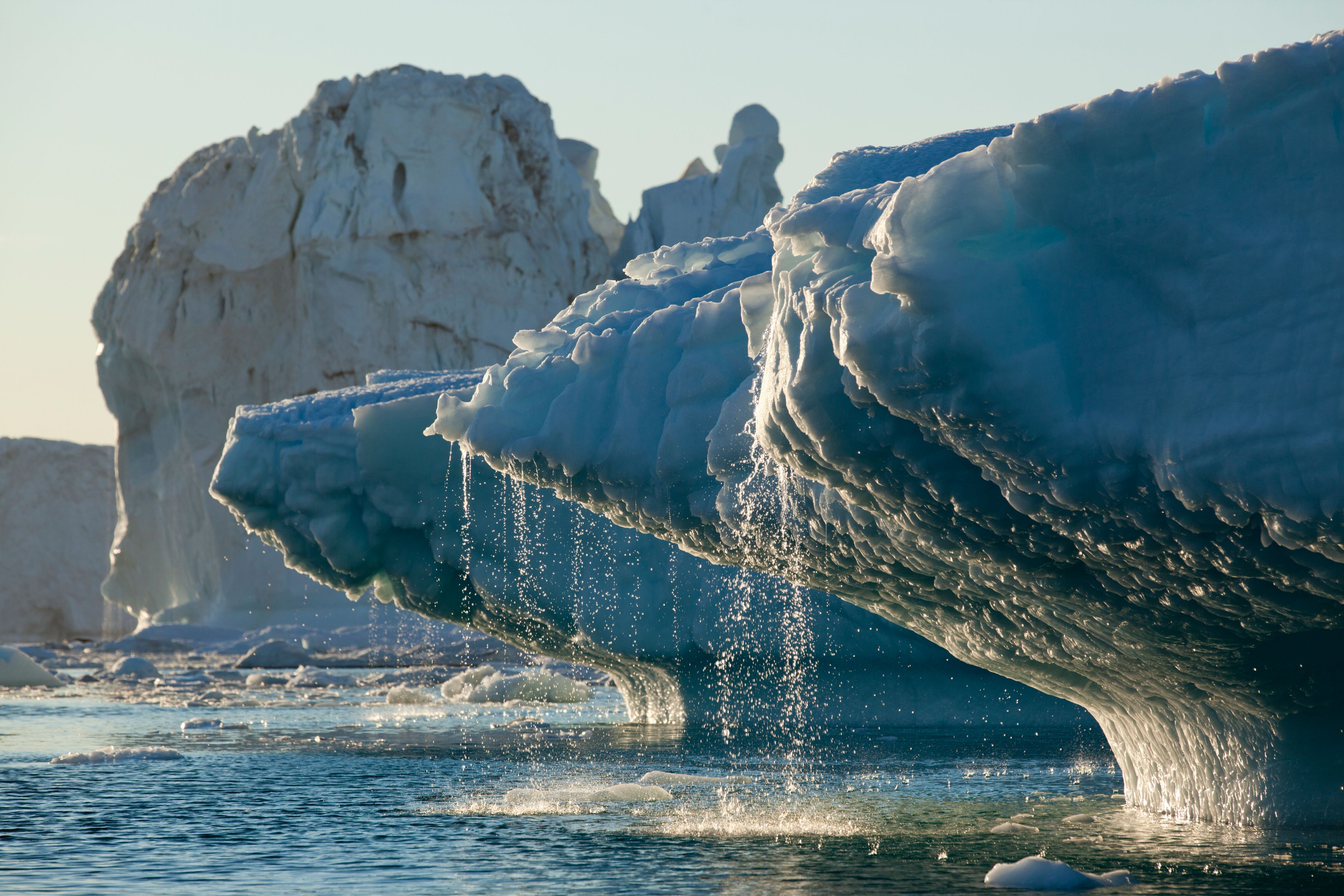 Water melting off a chunk of ice in the ocean