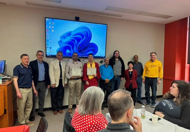 Awardees at the center flanked by faculty