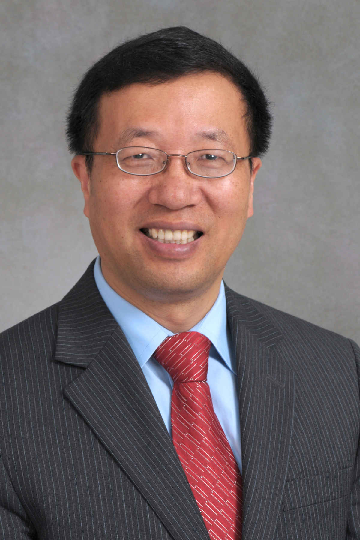 M. Zhang