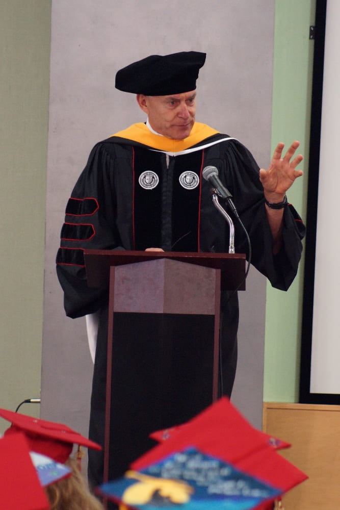 Dr. Greg Marshall giving the keynote speech at the SoMAS 2019 Convocation Ceremony.